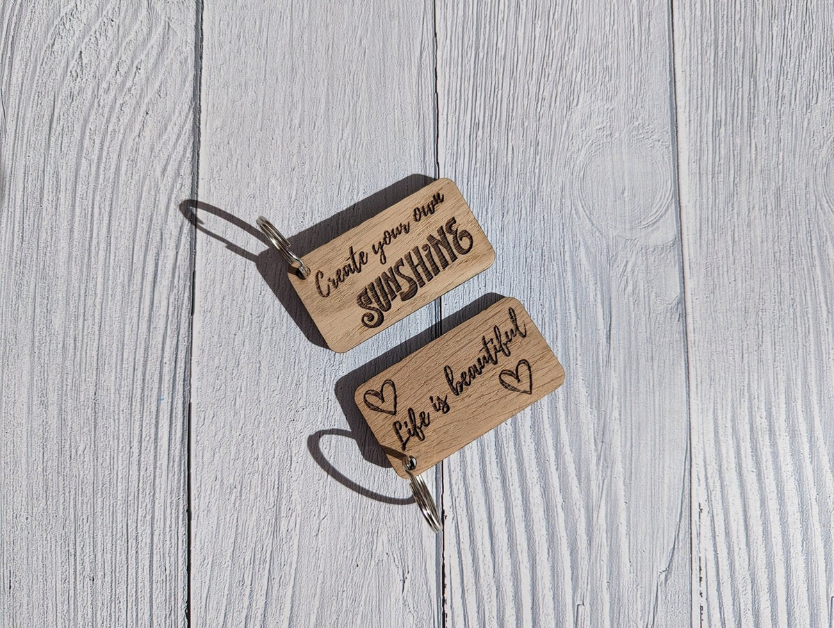 Uplifting Keyrings - "Create Your Own Sunshine" or "Life is Beautiful"